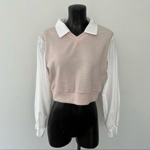 Cream sweater vest with white blouse
